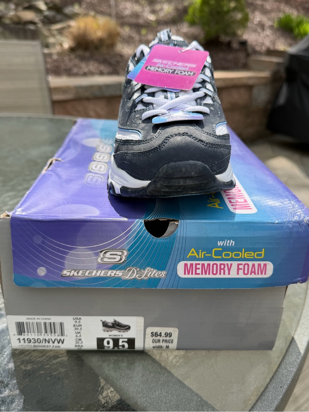 Skechers D'Lites Black Sneaker with Light Blue Accents. New in box. WomenSize 11